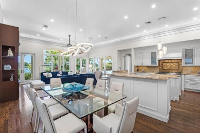 This exceptional lakeside estate blends sophistication, comfort on Bocaire Country Club in Florida - for sale on GolfHomes.com, golf home, golf lot