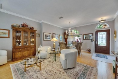Welcome to luxury living at its finest in the highly sought on Hunters Green Country Club in Florida - for sale on GolfHomes.com, golf home, golf lot