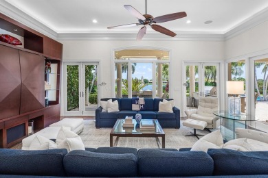 This exceptional lakeside estate blends sophistication, comfort on Bocaire Country Club in Florida - for sale on GolfHomes.com, golf home, golf lot