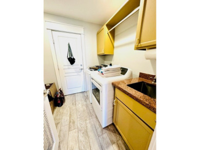 Income-Producing Waterfront Luxury! This channel-front townhome on South Padre Island Golf Club in Texas - for sale on GolfHomes.com, golf home, golf lot
