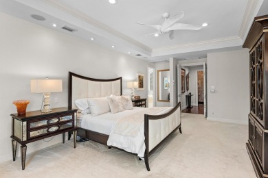 This exceptional lakeside estate blends sophistication, comfort on Bocaire Country Club in Florida - for sale on GolfHomes.com, golf home, golf lot