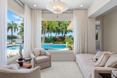 This exceptional lakeside estate blends sophistication, comfort on Bocaire Country Club in Florida - for sale on GolfHomes.com, golf home, golf lot