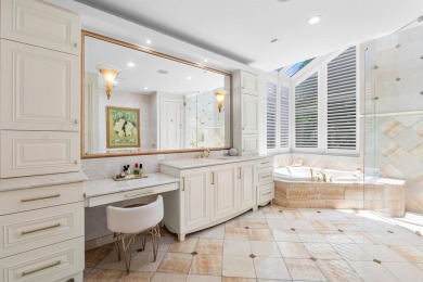 This exceptional lakeside estate blends sophistication, comfort on Bocaire Country Club in Florida - for sale on GolfHomes.com, golf home, golf lot