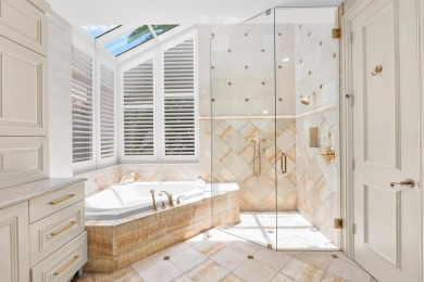 This exceptional lakeside estate blends sophistication, comfort on Bocaire Country Club in Florida - for sale on GolfHomes.com, golf home, golf lot