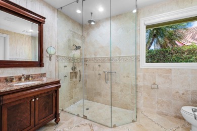 This exceptional lakeside estate blends sophistication, comfort on Bocaire Country Club in Florida - for sale on GolfHomes.com, golf home, golf lot
