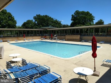 For your downsizing pleasure---a perfect corner unit away from on Leisure World Golf Club in Maryland - for sale on GolfHomes.com, golf home, golf lot