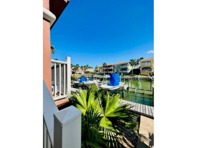 Income-Producing Waterfront Luxury! This channel-front townhome on South Padre Island Golf Club in Texas - for sale on GolfHomes.com, golf home, golf lot