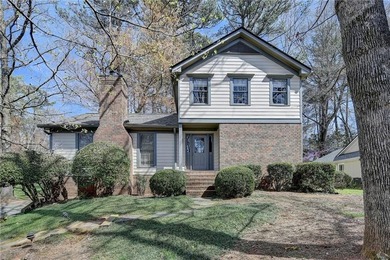 Nestled in the heart of a sought-after golf and tennis community on Horseshoe Bend Country Club in Georgia - for sale on GolfHomes.com, golf home, golf lot