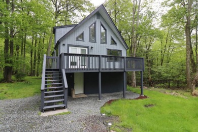 Stunning 4-Bedroom, 3-Bath Contemporary Home in Amenity-Rich on Thornhurst Country Club in Pennsylvania - for sale on GolfHomes.com, golf home, golf lot