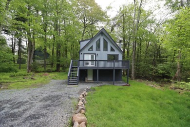 Stunning 4-Bedroom, 3-Bath Contemporary Home in Amenity-Rich on Thornhurst Country Club in Pennsylvania - for sale on GolfHomes.com, golf home, golf lot