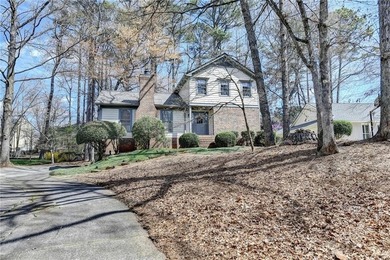 Nestled in the heart of a sought-after golf and tennis community on Horseshoe Bend Country Club in Georgia - for sale on GolfHomes.com, golf home, golf lot