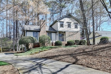 Nestled in the heart of a sought-after golf and tennis community on Horseshoe Bend Country Club in Georgia - for sale on GolfHomes.com, golf home, golf lot