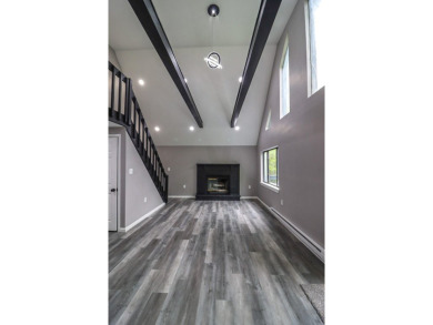 Stunning 4-Bedroom, 3-Bath Contemporary Home in Amenity-Rich on Thornhurst Country Club in Pennsylvania - for sale on GolfHomes.com, golf home, golf lot