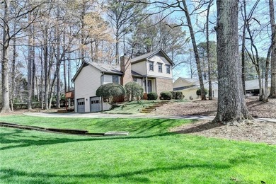 Nestled in the heart of a sought-after golf and tennis community on Horseshoe Bend Country Club in Georgia - for sale on GolfHomes.com, golf home, golf lot