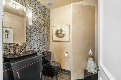 This exceptional lakeside estate blends sophistication, comfort on Bocaire Country Club in Florida - for sale on GolfHomes.com, golf home, golf lot