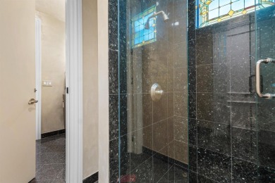 This exceptional lakeside estate blends sophistication, comfort on Bocaire Country Club in Florida - for sale on GolfHomes.com, golf home, golf lot