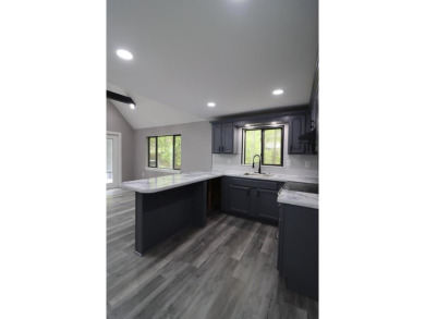 Stunning 4-Bedroom, 3-Bath Contemporary Home in Amenity-Rich on Thornhurst Country Club in Pennsylvania - for sale on GolfHomes.com, golf home, golf lot
