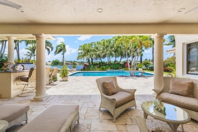 This exceptional lakeside estate blends sophistication, comfort on Bocaire Country Club in Florida - for sale on GolfHomes.com, golf home, golf lot