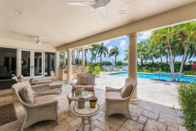 This exceptional lakeside estate blends sophistication, comfort on Bocaire Country Club in Florida - for sale on GolfHomes.com, golf home, golf lot