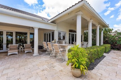 This exceptional lakeside estate blends sophistication, comfort on Bocaire Country Club in Florida - for sale on GolfHomes.com, golf home, golf lot