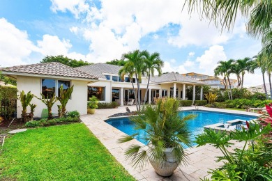 This exceptional lakeside estate blends sophistication, comfort on Bocaire Country Club in Florida - for sale on GolfHomes.com, golf home, golf lot