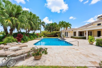 This exceptional lakeside estate blends sophistication, comfort on Bocaire Country Club in Florida - for sale on GolfHomes.com, golf home, golf lot