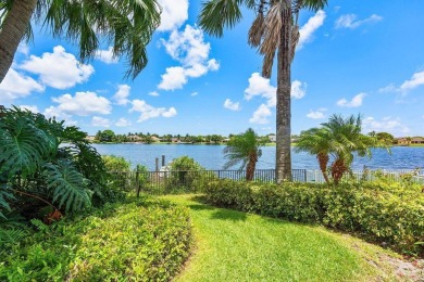 This exceptional lakeside estate blends sophistication, comfort on Bocaire Country Club in Florida - for sale on GolfHomes.com, golf home, golf lot