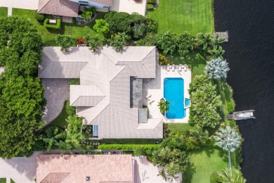 This exceptional lakeside estate blends sophistication, comfort on Bocaire Country Club in Florida - for sale on GolfHomes.com, golf home, golf lot