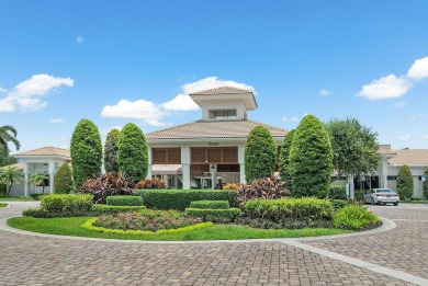 This exceptional lakeside estate blends sophistication, comfort on Bocaire Country Club in Florida - for sale on GolfHomes.com, golf home, golf lot