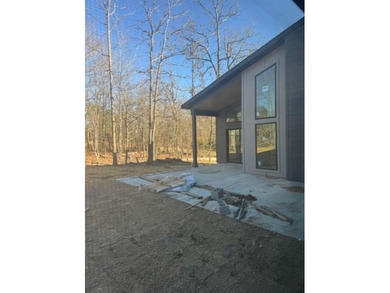 Bella Vista beauty showcasing modern architecture, upgraded on Branchwood Golf Course in Arkansas - for sale on GolfHomes.com, golf home, golf lot