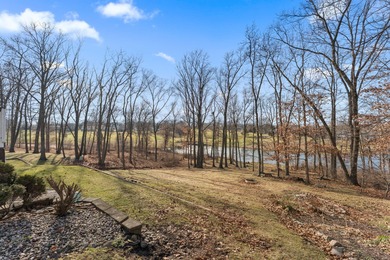 Located on a quiet cul-de-sac, this stunning & BEAUTIFULLY on Lakes of the Four Seasons Country Club in Indiana - for sale on GolfHomes.com, golf home, golf lot