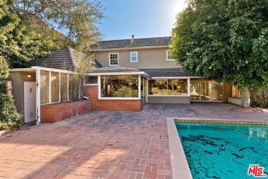 Set privately above the street in a premier Cheviot Hills on Rancho Park Golf Course in California - for sale on GolfHomes.com, golf home, golf lot