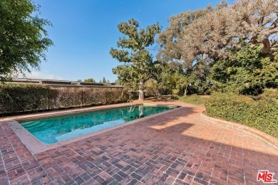 Set privately above the street in a premier Cheviot Hills on Rancho Park Golf Course in California - for sale on GolfHomes.com, golf home, golf lot