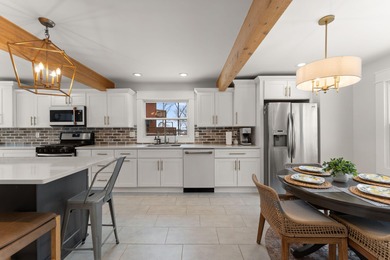 Located on a quiet cul-de-sac, this stunning & BEAUTIFULLY on Lakes of the Four Seasons Country Club in Indiana - for sale on GolfHomes.com, golf home, golf lot