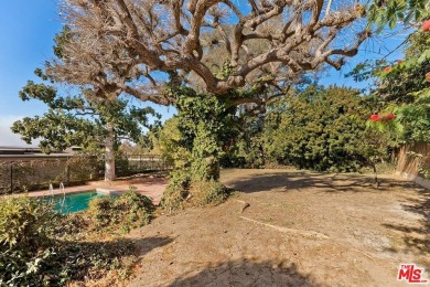 Set privately above the street in a premier Cheviot Hills on Rancho Park Golf Course in California - for sale on GolfHomes.com, golf home, golf lot