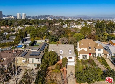 Set privately above the street in a premier Cheviot Hills on Rancho Park Golf Course in California - for sale on GolfHomes.com, golf home, golf lot