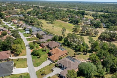 Nestled alongside the scenic 11th hole of the prestigious on Southern Woods Golf Club in Florida - for sale on GolfHomes.com, golf home, golf lot