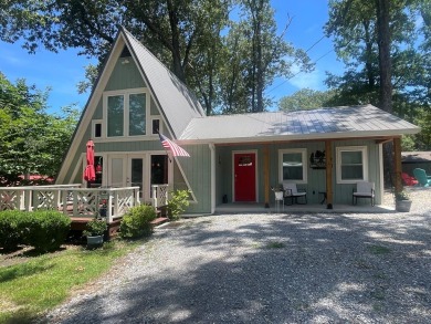 RESORT LIVING at its finest in this refreshing boat house style on Tennessean Golf Club in Tennessee - for sale on GolfHomes.com, golf home, golf lot