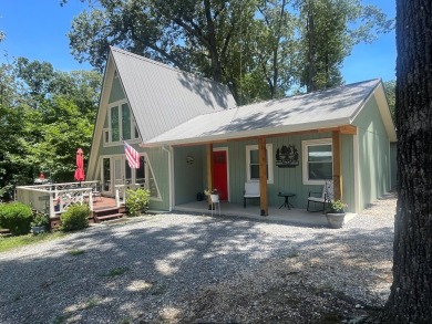 RESORT LIVING at its finest in this refreshing boat house style on Tennessean Golf Club in Tennessee - for sale on GolfHomes.com, golf home, golf lot