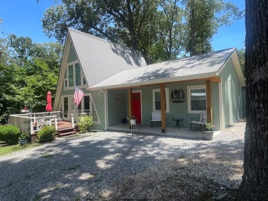 RESORT LIVING at its finest in this refreshing boat house style on Tennessean Golf Club in Tennessee - for sale on GolfHomes.com, golf home, golf lot