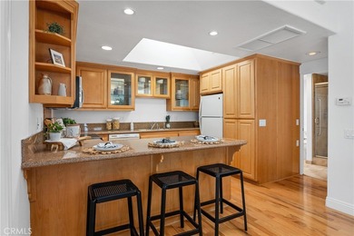 Beautiful fully expanded corner unit overlooking a small on Leisure World Seal Beach Golf Course in California - for sale on GolfHomes.com, golf home, golf lot