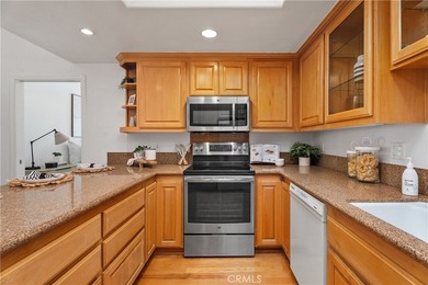 Beautiful fully expanded corner unit overlooking a small on Leisure World Seal Beach Golf Course in California - for sale on GolfHomes.com, golf home, golf lot