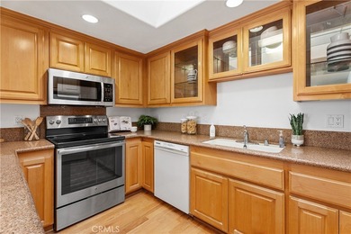 Beautiful fully expanded corner unit overlooking a small on Leisure World Seal Beach Golf Course in California - for sale on GolfHomes.com, golf home, golf lot