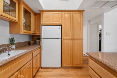 Beautiful fully expanded corner unit overlooking a small on Leisure World Seal Beach Golf Course in California - for sale on GolfHomes.com, golf home, golf lot