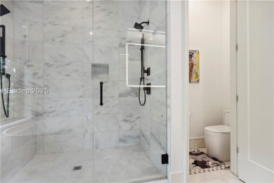 Experience the height of modern luxury with this 2023 on The Golf Club at Indigo Run in South Carolina - for sale on GolfHomes.com, golf home, golf lot