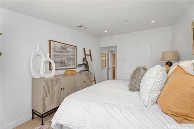 Beautiful fully expanded corner unit overlooking a small on Leisure World Seal Beach Golf Course in California - for sale on GolfHomes.com, golf home, golf lot