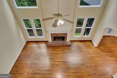 Stunning 5-Bedroom Home in Towne Lake Hills North - on Towne Lake Hills Golf Club in Georgia - for sale on GolfHomes.com, golf home, golf lot