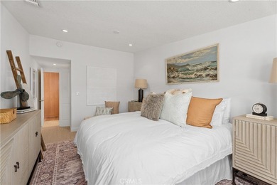 Beautiful fully expanded corner unit overlooking a small on Leisure World Seal Beach Golf Course in California - for sale on GolfHomes.com, golf home, golf lot