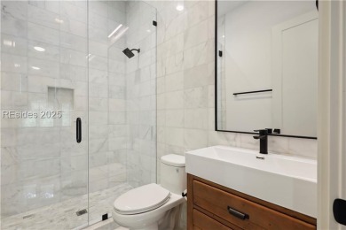 Experience the height of modern luxury with this 2023 on The Golf Club at Indigo Run in South Carolina - for sale on GolfHomes.com, golf home, golf lot