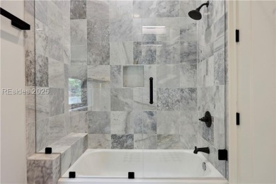Experience the height of modern luxury with this 2023 on The Golf Club at Indigo Run in South Carolina - for sale on GolfHomes.com, golf home, golf lot